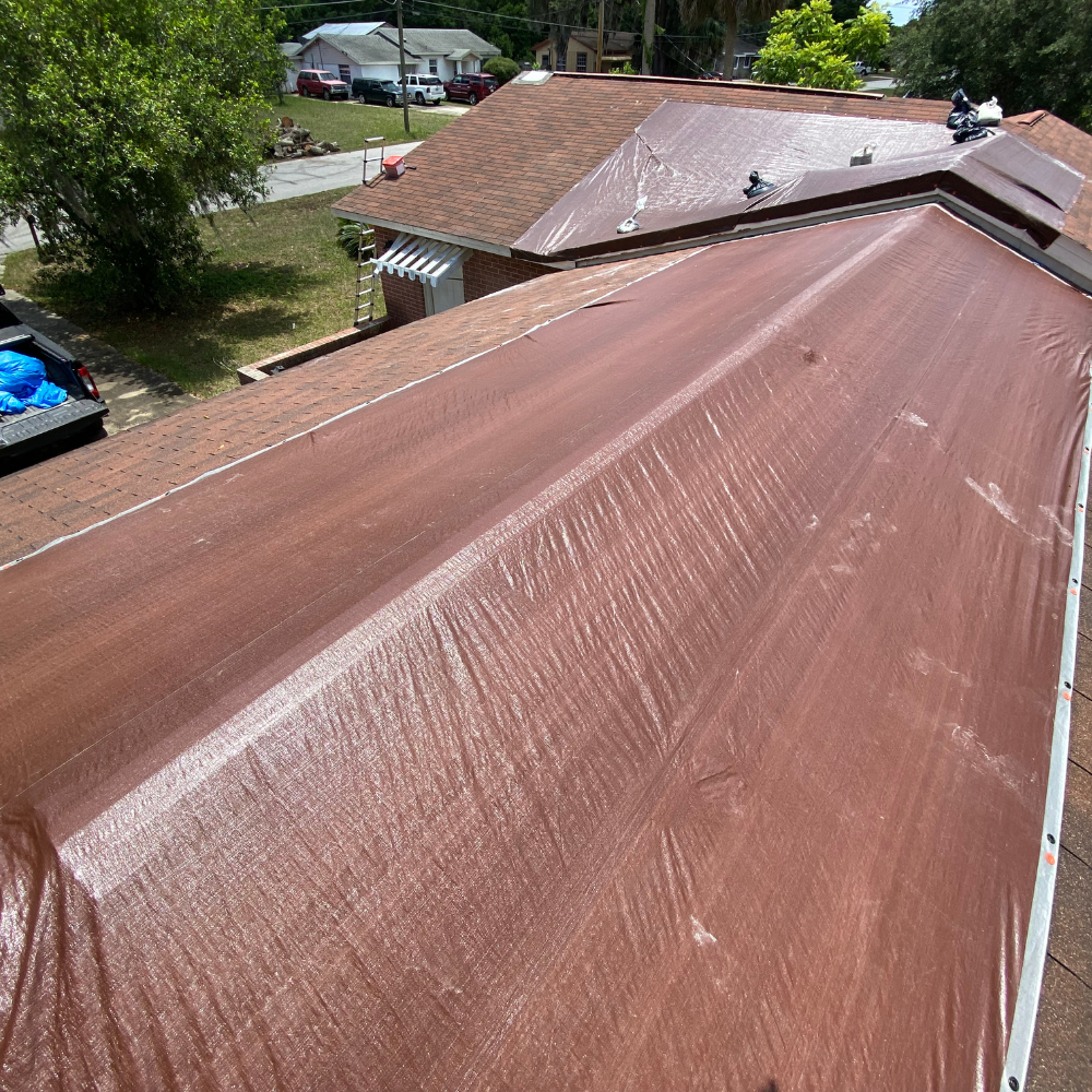 Emergency tarp installed on a damaged roof